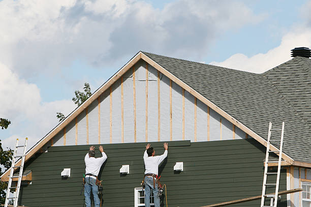 Professional Siding technician working in Sunbury, NC